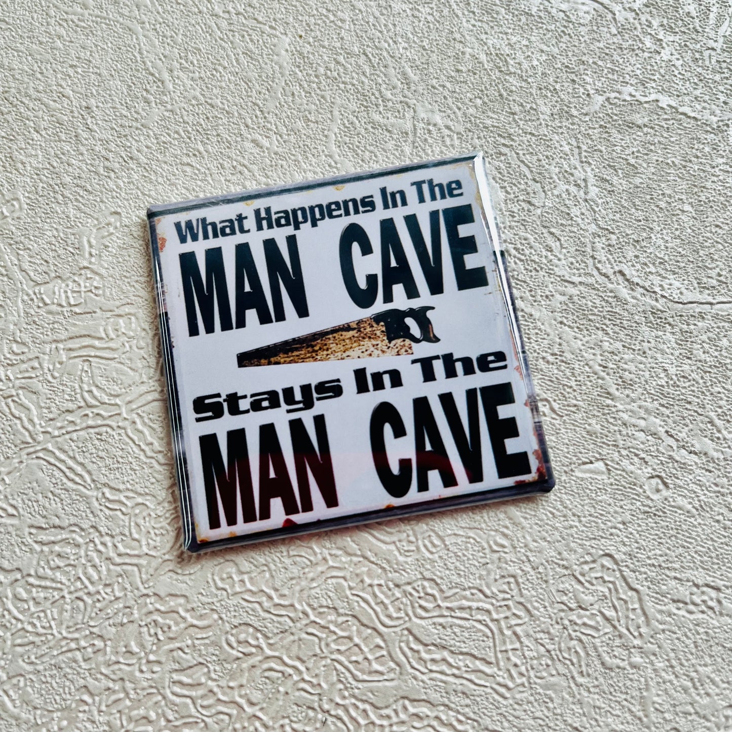 WHAT HAPPENS IN THE MAN CAVE MAGNET