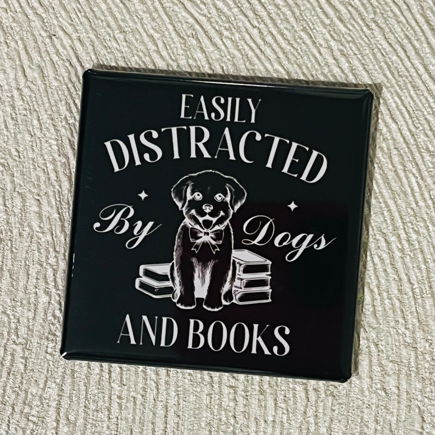 EASILY DISTRACTED BY DOGS AND BOOKS 2x2 SQUARE MAGNET